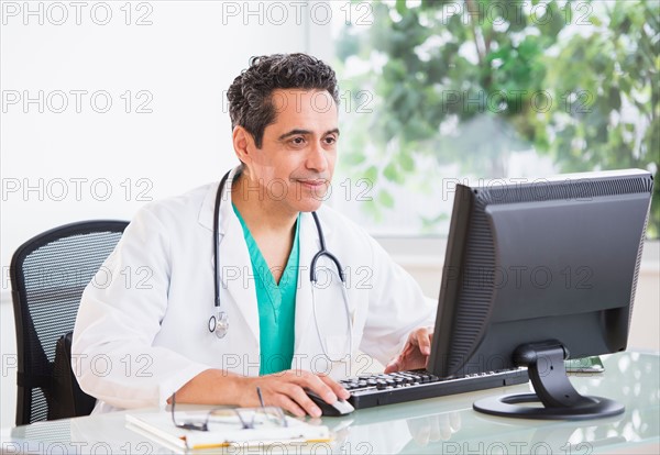 Portrait of doctor working in office