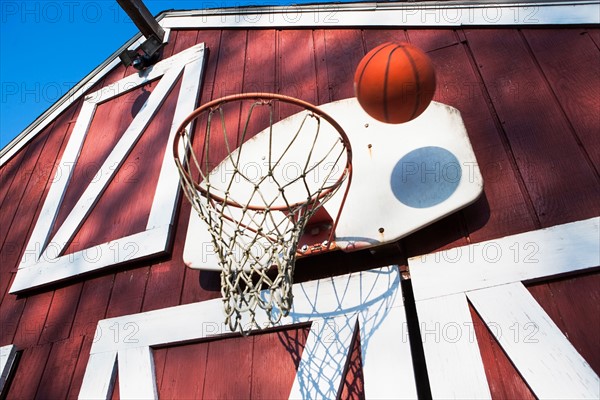 Basketball outside barn