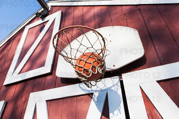 Basketball outside barn