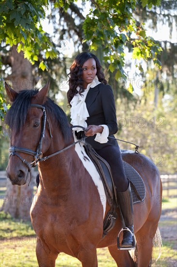 Beautiful woman horseriding