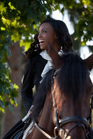 Beautiful woman horseriding