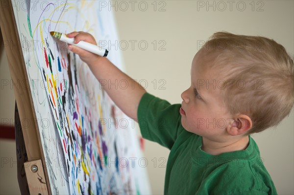 Toddler drawing on wall