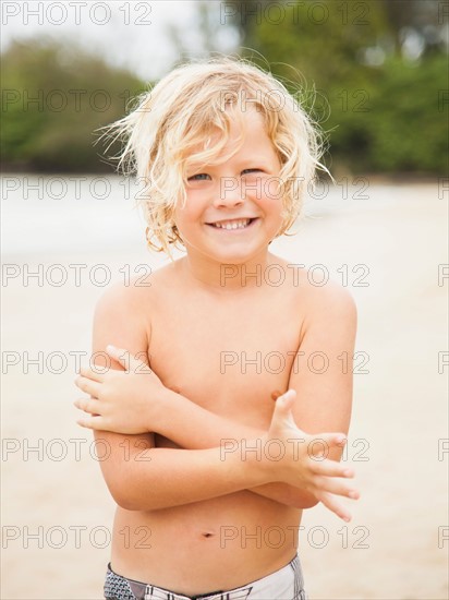 Portrait of boy (6-7) on beach