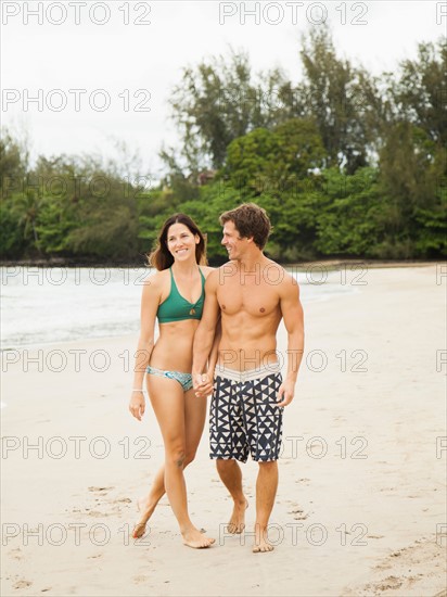 Couple walking on beach