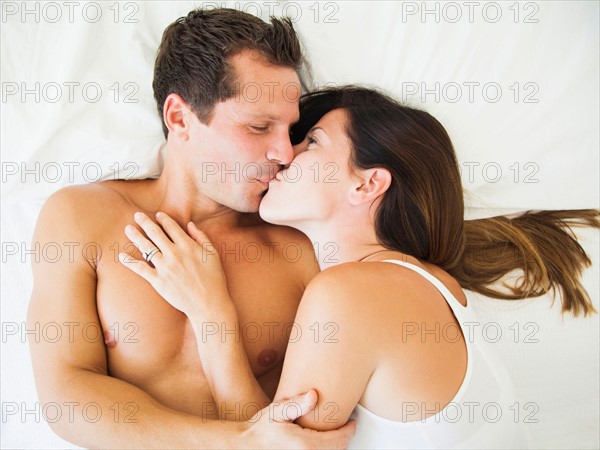 Couple lying on bed