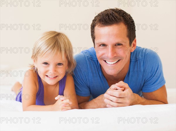 Father playing with daughter (2-3)