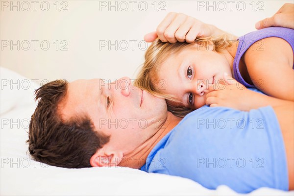 Father embracing daughter (2-3)