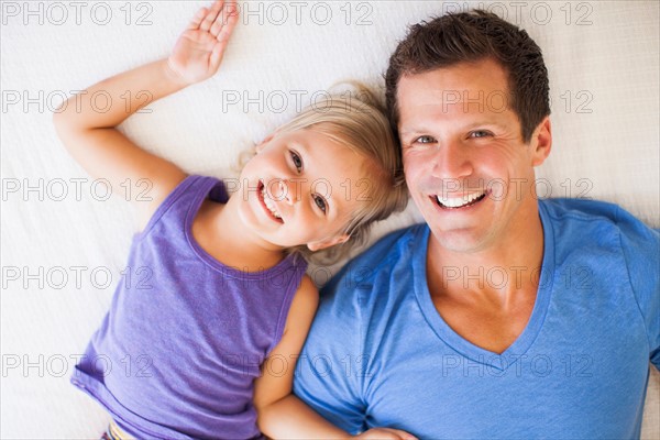 Father playing with daughter (2-3)