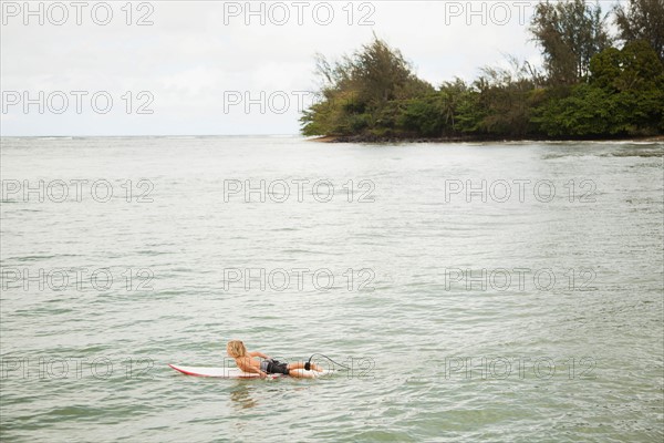 Boy (6-7) surfing