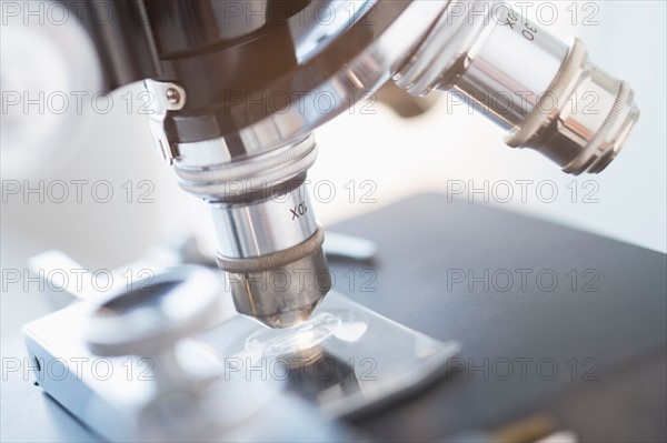 Studio shot of microscope, close-up.