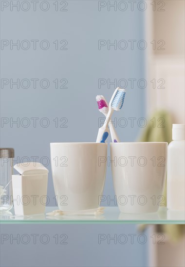 His and hers toothbrushes.