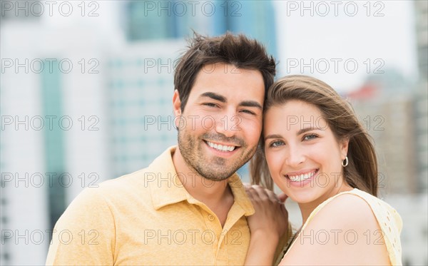 Portrait of smiling couple.