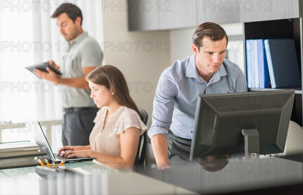 Business people working in office.