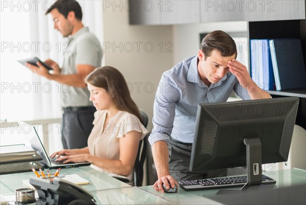 Business people working in office.