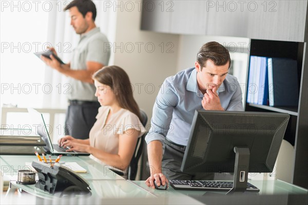 Business people working in office.