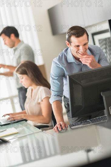 Business people working in office.