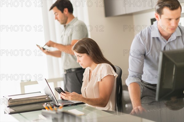 Business people working in office.