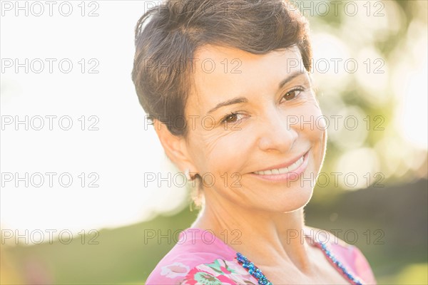 Portrait of mature woman smiling .