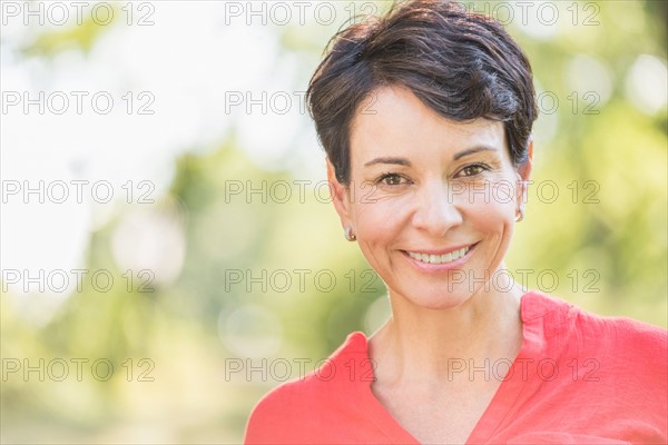 Portrait of happy mature woman smiling.
