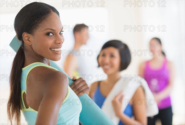 People socializing in gym.