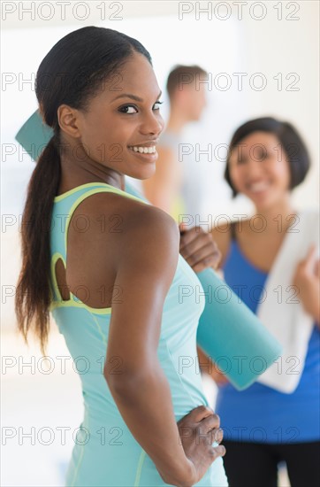 People socializing in gym.