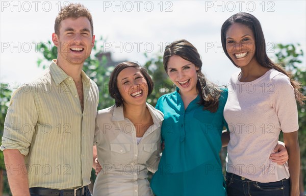 Friends laughing outside.