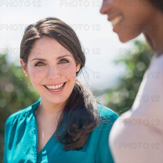 Young women smiling.