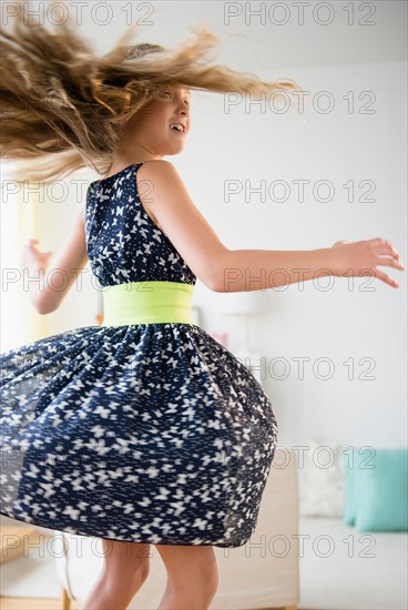 View of girl (8-9) dancing