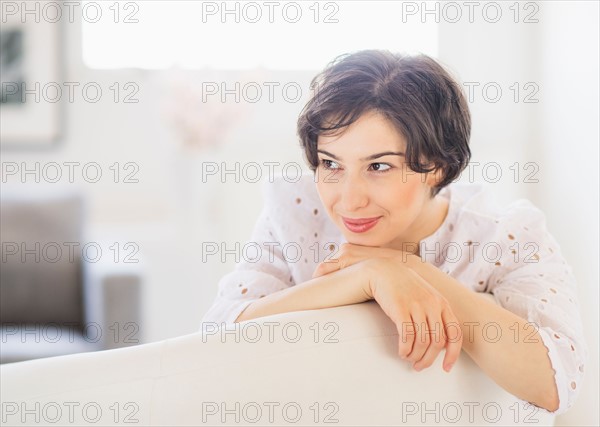 Portrait of young woman daydreaming