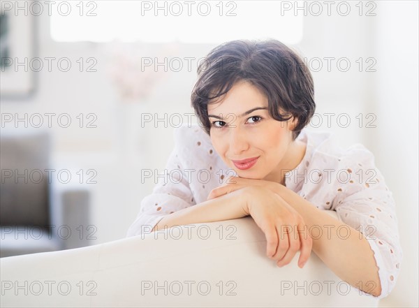 Portrait of young woman daydreaming