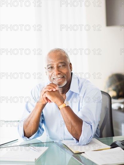 Portrait of man in office