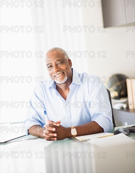 Portrait of man in office