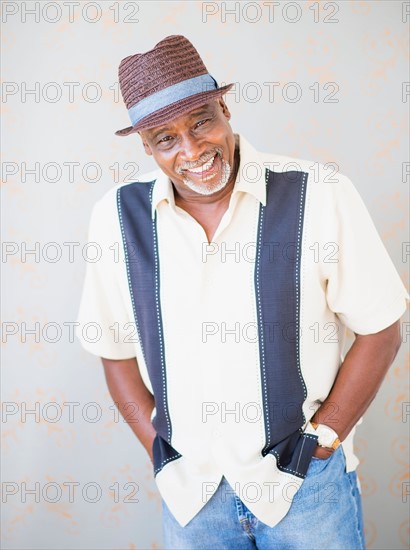 Portrait of man wearing straw hat