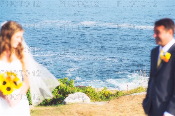 Bride and groom looking at each other