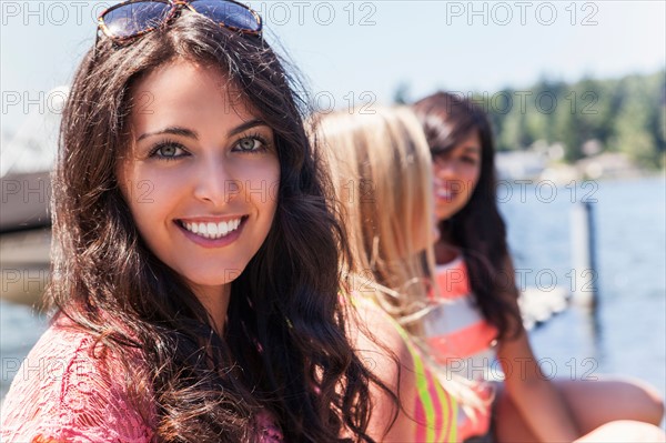 Portrait of three young women outdoors