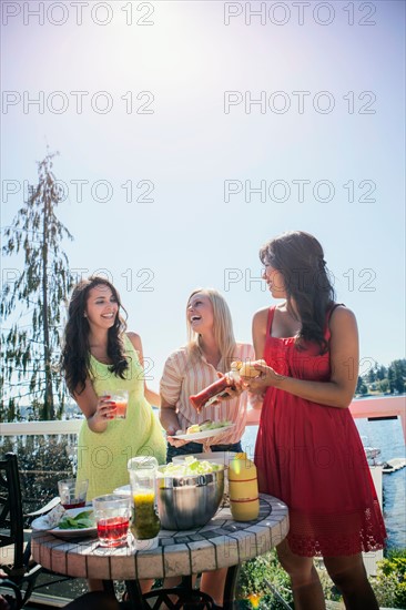 Young women enjoying barbecue