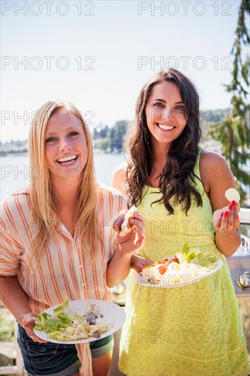 Young women enjoying barbecue