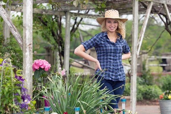 Portrait of young woman in garden