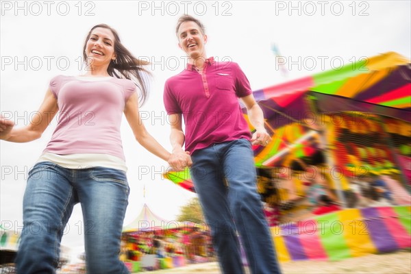 Couple in amusement park