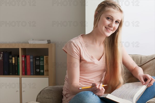 Girl (14-15) studying