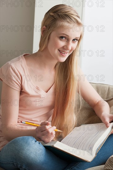 Girl (14-15) studying