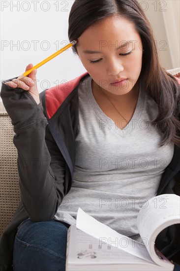 Girl (16-17) studying