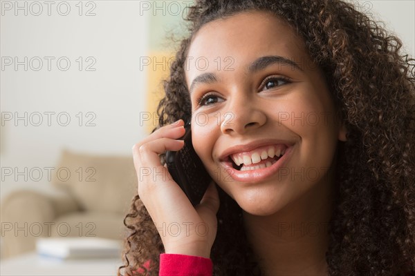 Portrait of girl (12-13) talking on her mobile
