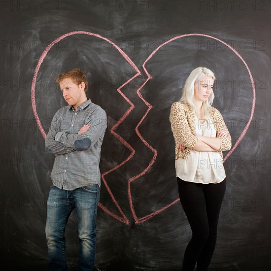 Studio portrait of separated couple