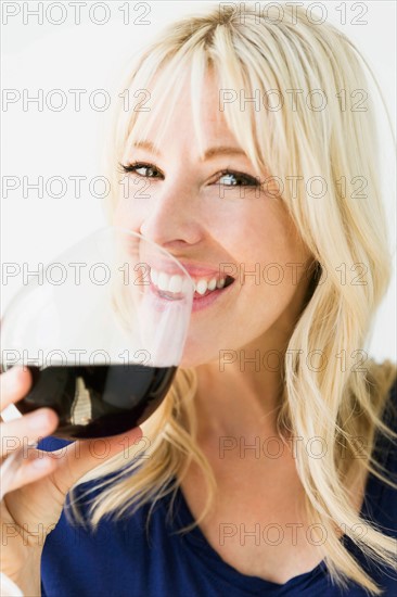 Studio portrait of blonde woman