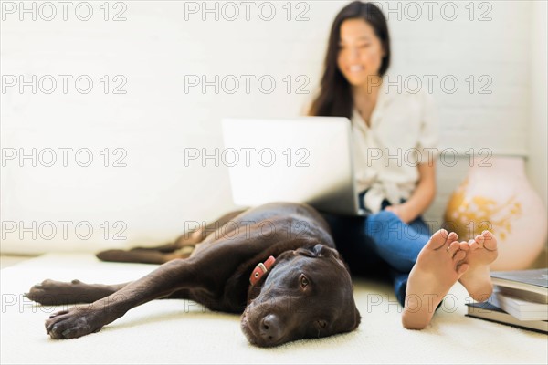 Young woman with labrador