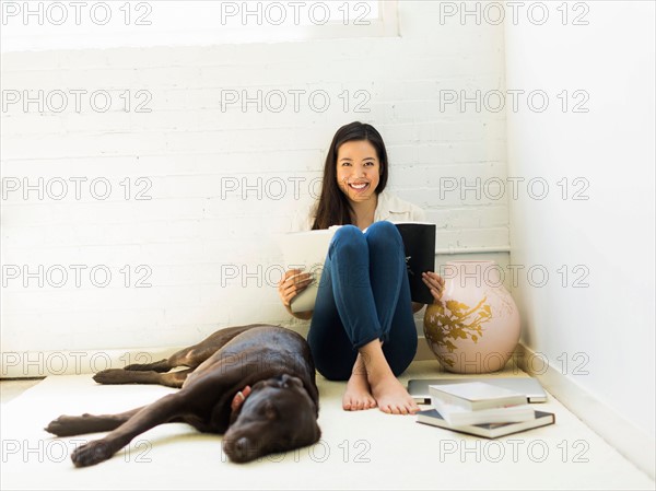 Young woman with labrador