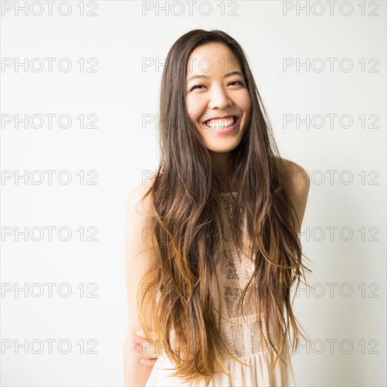 Portrait of woman with long brown hair