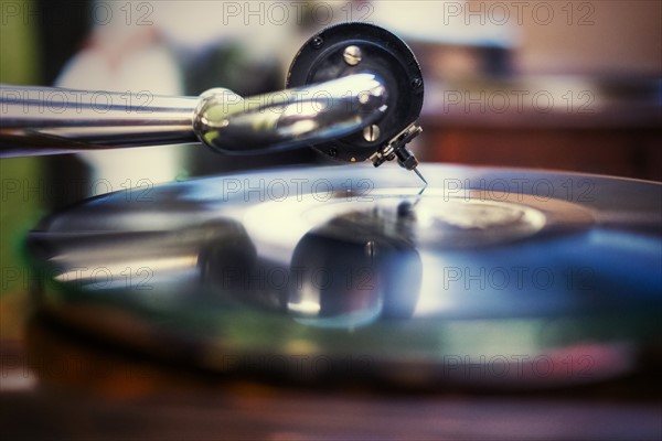 Studio close-up of record player.