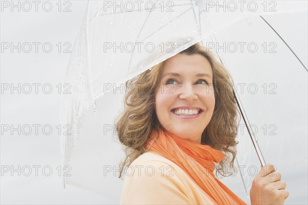 Woman with umbrella.